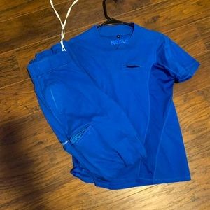 Benefit Royal Blue Scrubs: Medium Top and Medium Tall Bottoms.